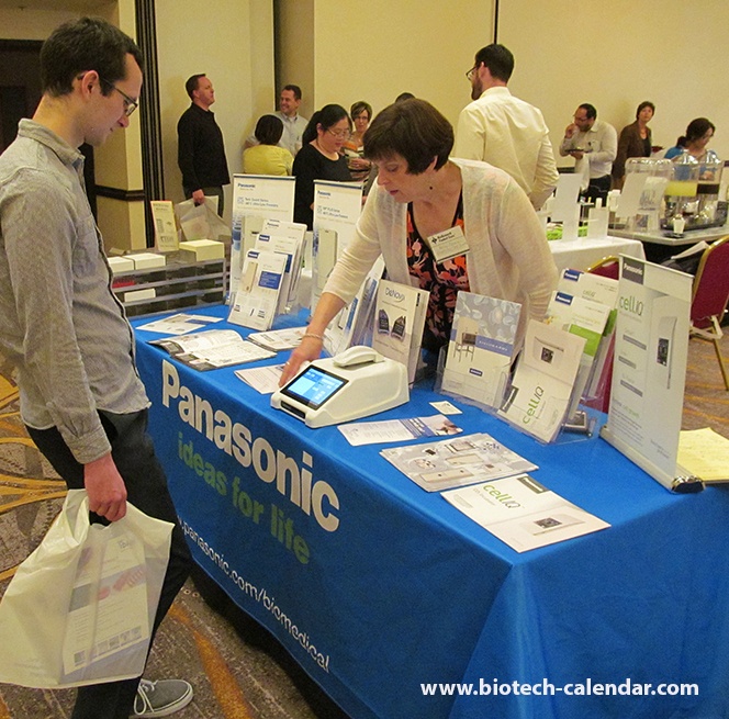 Panasonic Healthcare Corporation Shows Lab Equipment to Scientist at Rochester, Minnesota BioResearch Product Faire™ Event