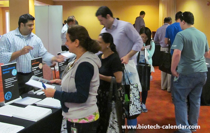 Scientist Examines Lab Supplies at University of California, Davis Medical Center BioResearch Product Faire™ Event
