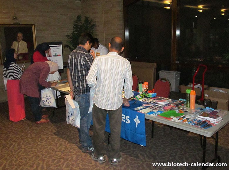 Laboratory scientists return their completed gift cards to get the opportunity to select a doorprize and enter in a drawing at the BCI event in Columbus