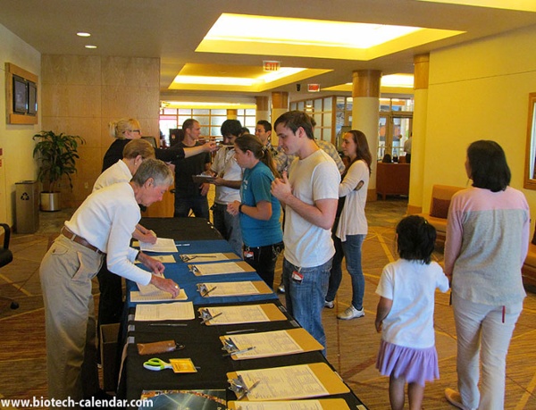 Researchers sign in at the entrance to the BCI BioResearch Product Faire™ at the University of Cincinnati.