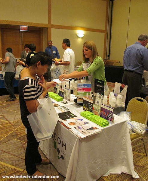 Researchers browse the science exhibits at the University of Cincinnati BioResearch Product Faire™ Event.