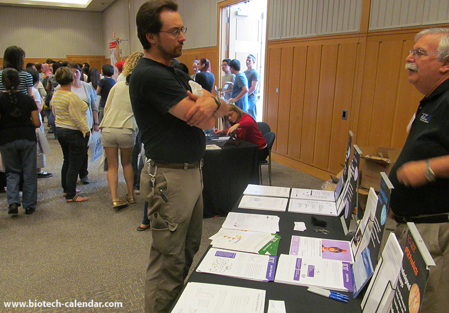 Life science vendors have one-on-one conversations with scientists at the BioResearch Product Faire™ event in Ann Arbor