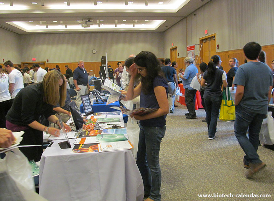 Laboratory researchers view equipment and services overviews that exhibitors have to offer at the BioResearch Product Faire at the University of Michigan.